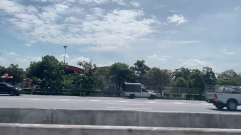 View through the side window of moving car on the road. Stock Footage 201368978
