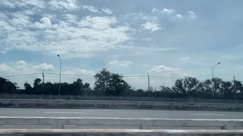 View through the side window of moving car on the road. Stock Footage 201369679