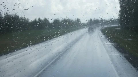 View Through The Splattered Window Of The Bus. Cars Are Moving towards us. Dull. Stock Footage 182299781