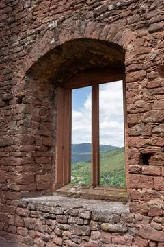 View Through Stone Window of Limburg Monastery Ruins Over Forested Hills in.. Stock Photos