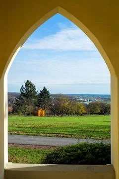 View through stone window in the wall of castle. View through stone window... Stock Photos