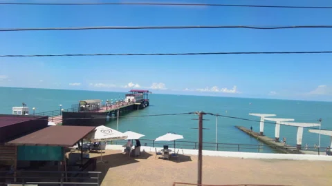 View through the train window to the Black Sea shore near the city of Sochi. Stock Footage 250700166