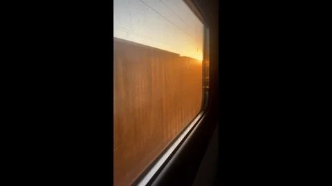 View through the train window at oncoming carriages Stock Footage 304670278