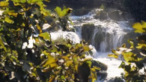 A view through the trees on the famous waterfalls of Krka Stock-Footage 118974937