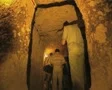 View through underground passage with tour group SD Footage