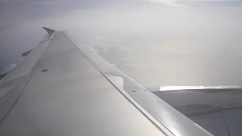 View through the window of the airplane from inside cabin while flyiing cli.. Stock Footage 301199129