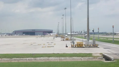 View through window of airplane taxiing at suvarnabhumi airport with many a.. Stock Footage 289814809