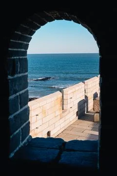 View through the window of the beginning of the Great Wall of China 스톡 사진