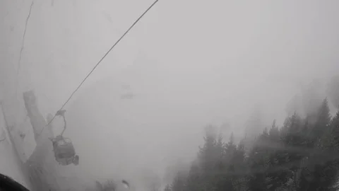View through the window of the cable car descending to the arrival station pa Stock Footage 78219253