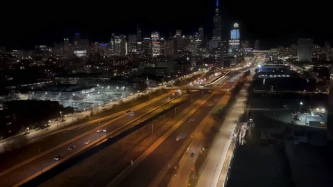 View through the window on the city of Chicago at night. Night traffic of cars Stock Footage 166973386