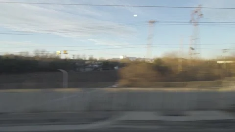 View through the window of the high speed train while moving fast through l.. Vídeos de archivo 331302796