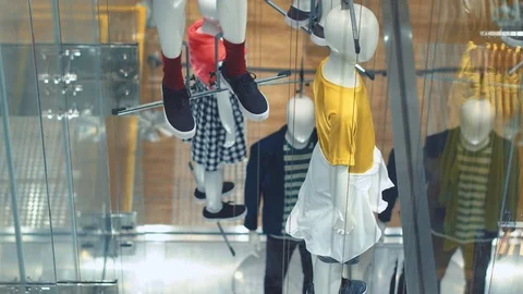 View through window to modern concept manikins at the store. Stock Footage 88901585