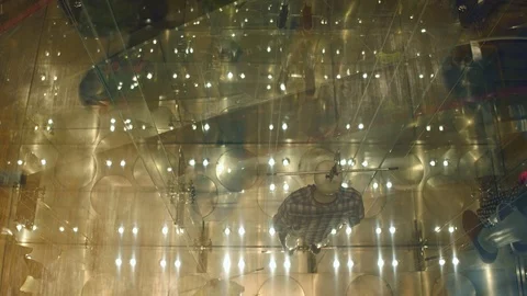 View through window to modern concept manikins at the store. Stock Footage 88902065