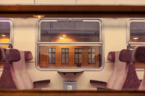 View through the window of a night train at the station 스톡 사진