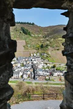 View through a window in the outer wall of castle Cochem over the Moselle Riv Stock Photos
