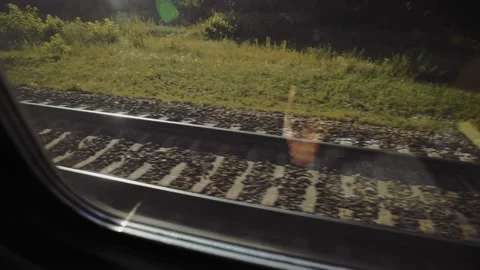 View through the window to the outside of the tracks. Atmospheric journey. Stock-Footage 165741359