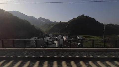 View through window on provinces of China in high-speed train. Stock Footage 107623785