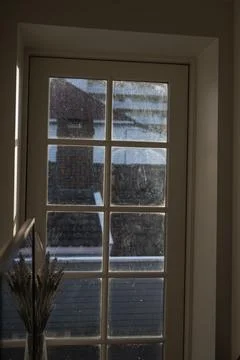 View Through a Window with Rooftops in Stavanger, Norway Stock Photos