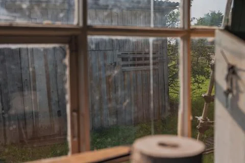 View Through a Window of a Rustic Wooden Shed in Rural Belarus Stock Photos