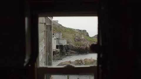 View through a window of St. John's coastline Stock Footage 111399312