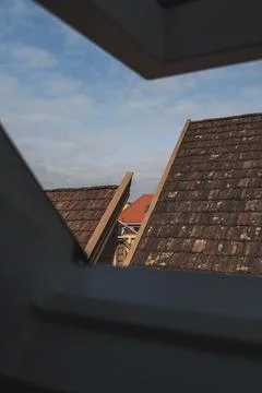 View Through a Window of Tiled Rooftops in Stavanger, Norway Stock Photos