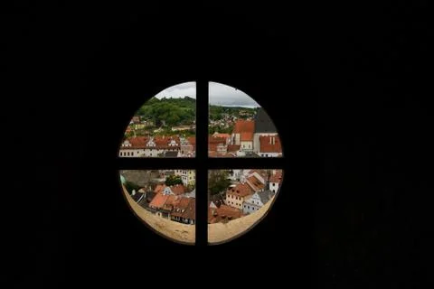 View through the window on the tower of the castle and the view of Cesky Krum Фото