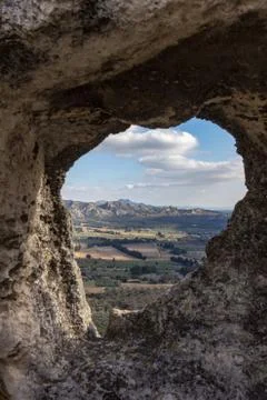 View through a window of the valley between Les Baux de Provence and Alpilles Stock Photos