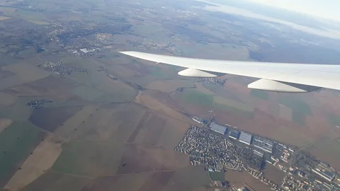 A view through the windows of an airplane in flight Stock Footage 113259627