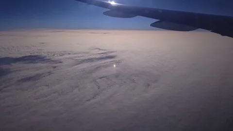 A view through the windows of an airplane in flight Stock Footage 113259697