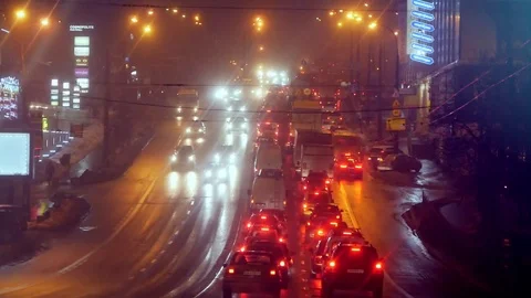 View Through The Windshield Of A Car To City Road With Massive Traffic At Night Stock Footage 114747537