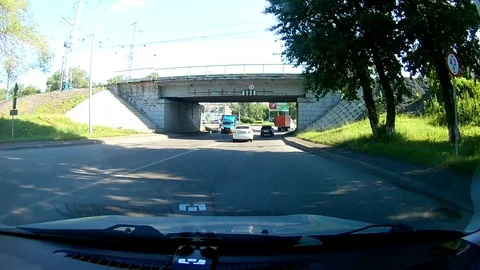 A view through the windshield of a car driving down the highway. Stock Footage 111960787