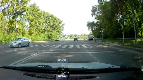 A view through the windshield of a car driving down the highway. Stock Footage 111961200