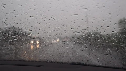 View through the windshield of a car on a highway with fog and heavy rain Stock Footage 276821002