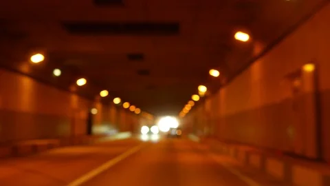 The view through the windshield of the car. movement in the tunnel. blur Stock Footage 124271512