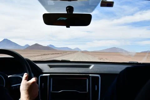 View through Windshield of Car with Mpuntain Horizon Stock Photos