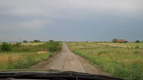 A view through the windshiled driving down a country road Stock-Footage 78252700