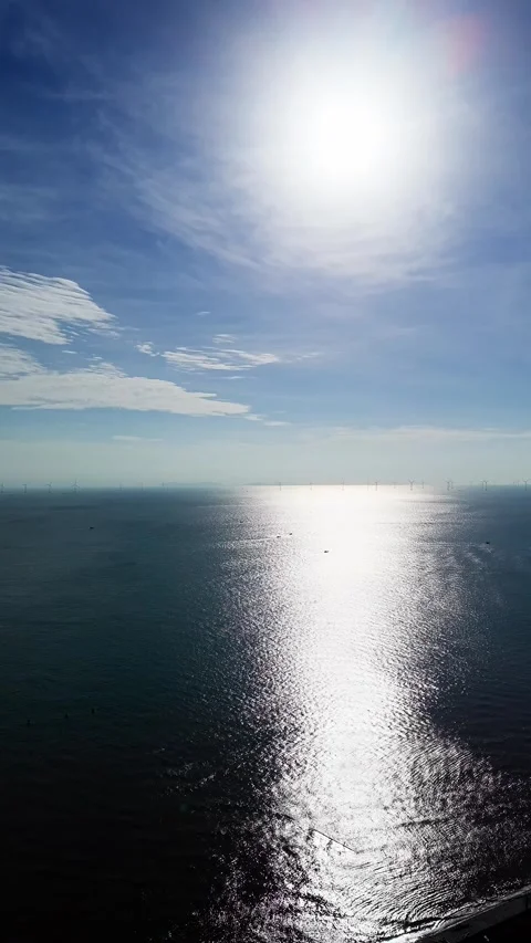 View of Thua Duc Beach in Vinh Long Vietnam with bright sun over water Vidéo 347754148