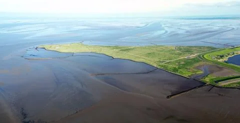 View of the tidal mudflats at the point of Reide in the Eemsdelta, Holland Stock Photos