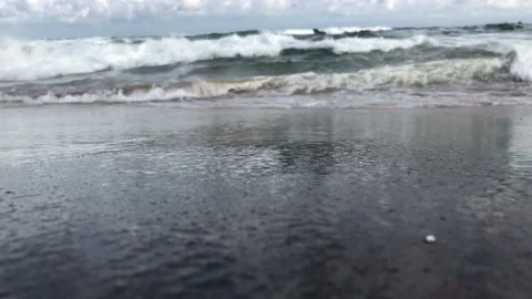 View of tides in a beach from low angle point of you Stock Footage 141509648