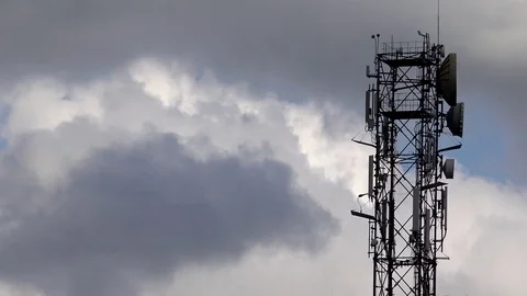 View of timelapse cloud pass radio antenna pylon receiver technology engineering Stock Footage 81967902