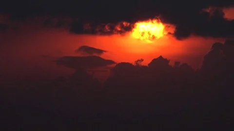 View of timelapse sun silhouette at sunset closeup of dramatic nightfall red sky Stock Footage 81975536