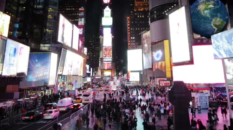 View from Times Square at night. Time lapsed. 2 in 1. Blurred faces/billboards. Stock Footage 59577580