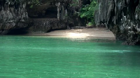 View of tiny beach at island in Andaman Sea near Phuket 4k Stock Footage 256574938