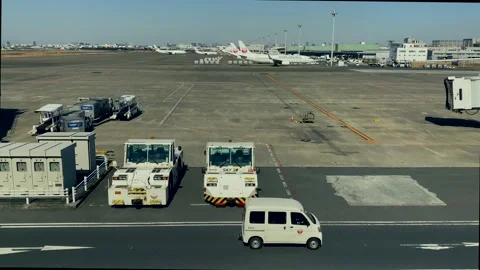 View of Tokyo Haneda Airport, with many planes ready to fly Stock Footage