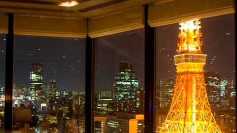 View on tokyo by night through windows Stock Photos