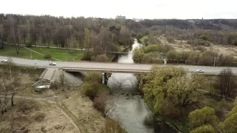 View from the top above the highway with a bridge over the river Stock Footage 305568391
