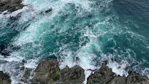 View from top of Aniva Lighthouse of waves crashing on rocks, pan on Sakhalin Video stock 209130832