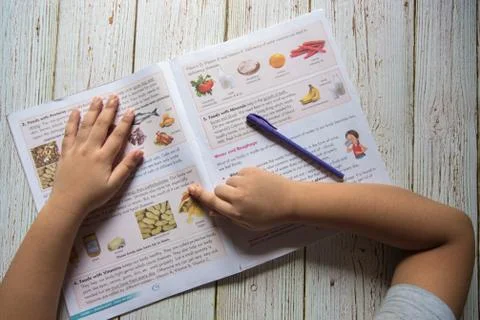 View from top of a boy doing his studies. Back to school Stock Photos