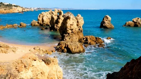 View from top of cliffs to Praia de Arrifes, Algarve, Portugal Stock Footage 87208487