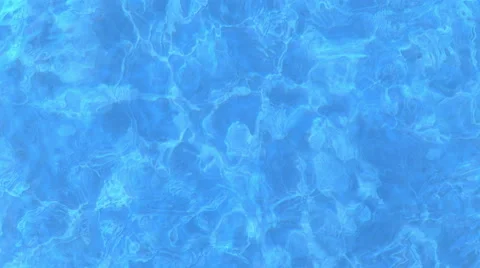 View from top at crystal clear blue water surface. Stock Footage